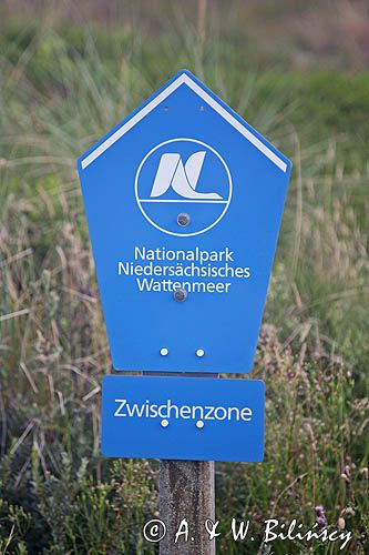 tablica parku narodowego na wyspie Spiekeroog, Wyspy Wschodnio-Fryzyjskie, Wattenmeer, Niemcy