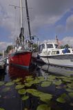 port jachtowy na farmie Luhrs Hohner Fahre na kanale Eider, Der Eiderkanall, Schleswig-Holsteinischer Canal, Niemcy