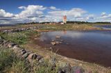 wybrzeże i latarnia morska na Rodkallen, Archipelag Lulea, Szwecja, Zatoka Botnicka