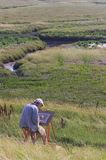 artysta malarz na wyspie Spiekeroog, Wyspy Wschodnio-Fryzyjskie, Wattenmeer, Niemcy